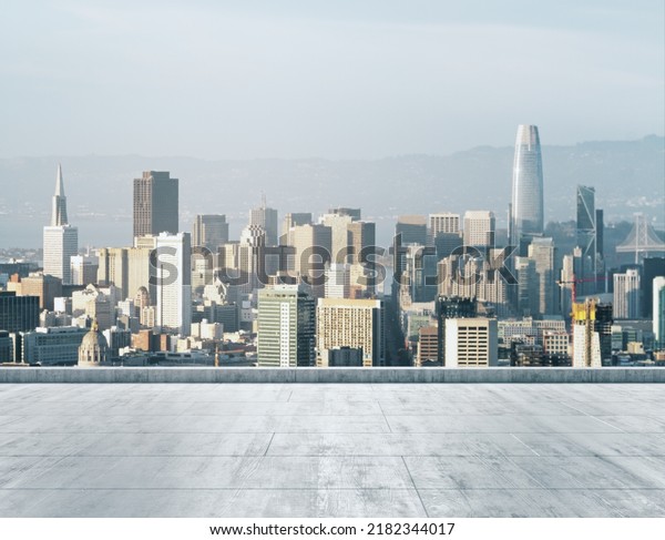 Empty concrete\
dirty rooftop on the background of a beautiful San Francisco city\
skyline at daytime, mock\
up