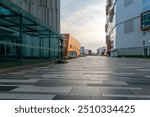 empty concrete ground in front of modern office buildings in downtown. floor for copy space