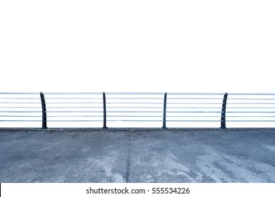 Empty Concrete Patio With Steel Railing