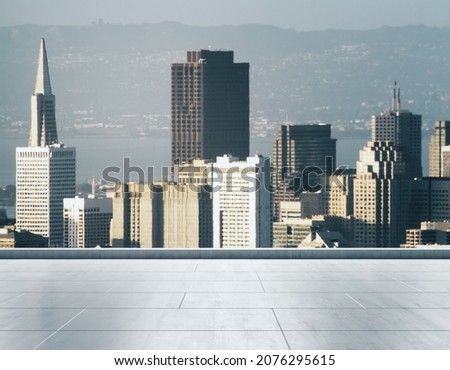 Empty concrete rooftop on the background of a beautiful San Francisco city skyline at daytime, mock up