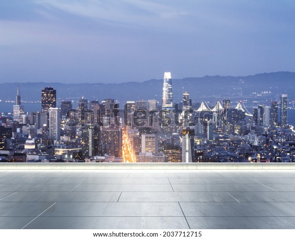 Empty concrete\
rooftop on the background of a beautiful blurry San Francisco city\
skyline at evening, mock\
up