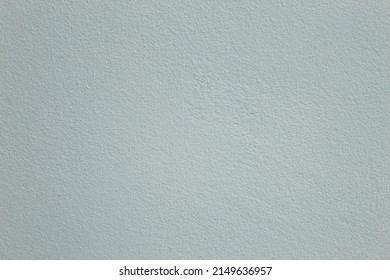 Empty concrete wall surface painted in a beautiful clean gray color.