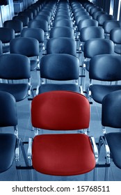 Empty Conference Room With One Red Chair