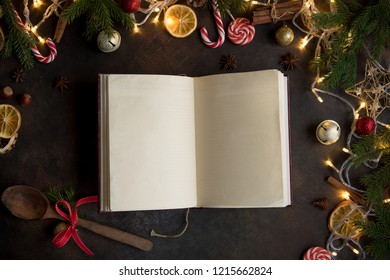 Empty Cookbook For Christmas Recipes On Dark Table. Cook Book With Festive Christmas Decor And Spices.