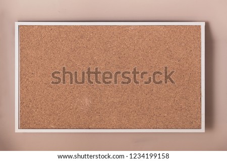 Empty cork board with frame background texture.