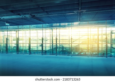 Empty Corridor In Airport Terminal, Modern Interior With Windows, No People, Selective Focus