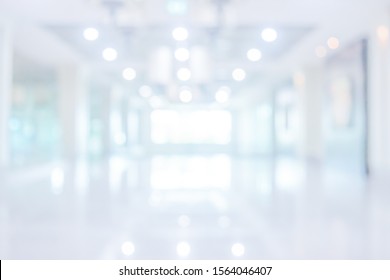 Empty Corridor In Modern Hospital Blurred  Interior Background
