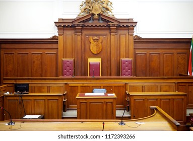 Empty courtroom, with old wooden panelling