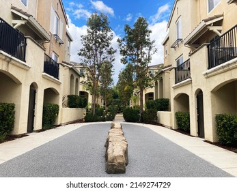 Empty courtyard, playground in residential townhouse complex