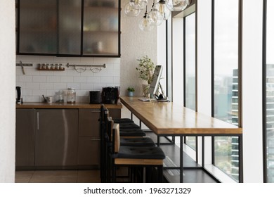 Empty Cozy Design Kitchen For Work Break Or Cooking Eating In Workspace In Company Office. Renovated Home With No People In Modern Building. Interior, Renovation, Rental, Realty Concept.