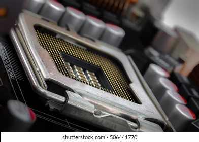 empty CPU socket between the capacitors and coils in the supply part on PCB motherboard