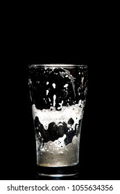 Empty Craft Beer Glass On Black Background