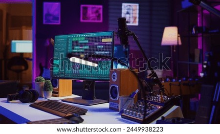 Empty creative space recording tunes and soundtracks with electronic tools, mixing and mastering in music industry. Home studio working with audio effects on songs, acoustics. Camera B.
