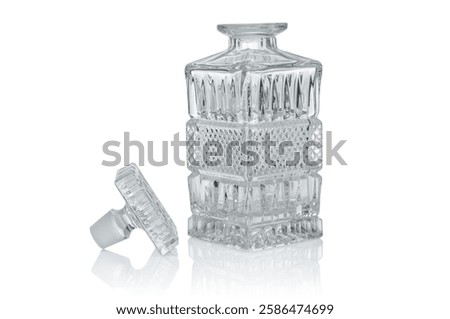 Empty crystal decanter isolated on white background