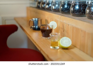 Empty cup and coffee drip