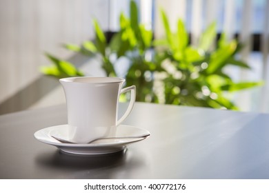 Empty cup of coffee in Meeting room at the office  - Shutterstock ID 400772176