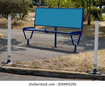 Empty curbside bus bench with copy space.                               