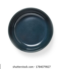 Empty Dark Blue Ceramic Bowl Or Ramekin Isolated On A White Background. Empty Crockery For Food Design. Clay, Ceramics Or Porcelain Tableware. Ceramics Texture. Top View.