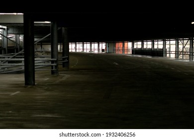 An Empty And Dark Parking Garage