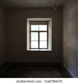 Empty dark room with  window