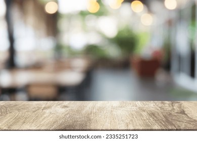 Empty dark wooden table in front of abstract blurred bokeh background of restaurant . can be used for display or montage your products.Mock up for space. - Powered by Shutterstock