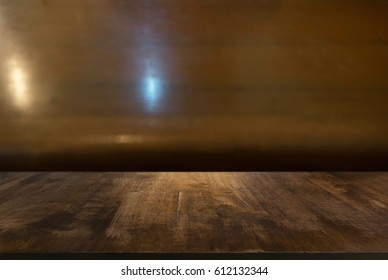 Empty Dark Wooden Table In Front Of Abstract Blurred Background Of Dark Wood . Can Be Used For Display Or Montage Your Products.Mock Up For Display Of Product