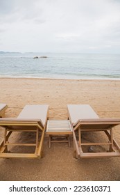Empty deck chairs on the beach.