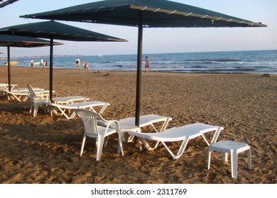 Empty deckchairs on the beach