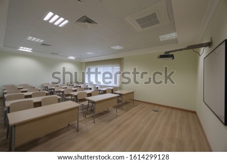 Empty desks in the classroom.