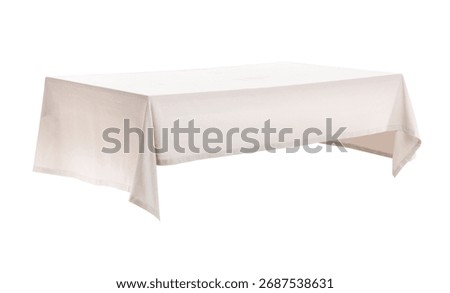 Empty dining table with stylish tablecloth isolated on white background