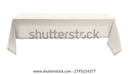 Empty dining table with stylish tablecloth isolated on white background