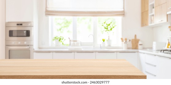 Empty dining table top in blurred interior of modern kitchen - Powered by Shutterstock