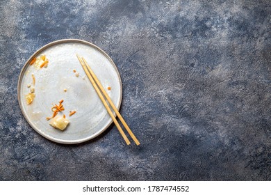 Empty Dirty Dish After Korean Kimchi With Chopstick