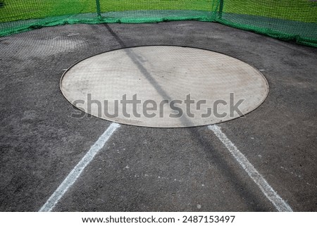 empty discus and hammer throwing ring outdoors