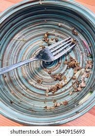 Empty dish with fork on table, Top view