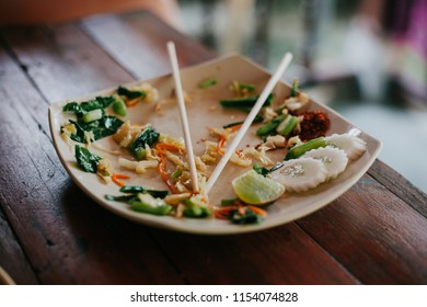 Empty dishes with vegetables