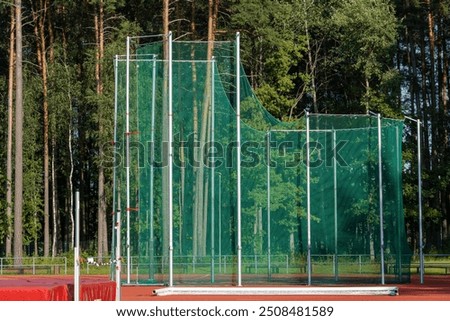 Empty disk throwing training arena in a stadium. Athletics stadium. 
