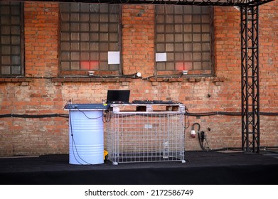 Empty DJ Booth Against A Brick Wall. Party At A Closed Factory