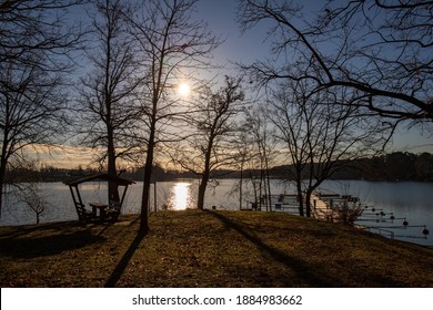 Empty docks in the port of Scharmuetzelsee, Brandenburg, Germany. Empty docks in winter under the clear sky at noon.