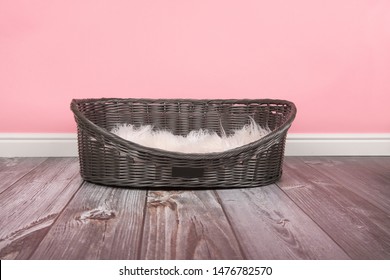 Empty Dog Bed On A Pink Background