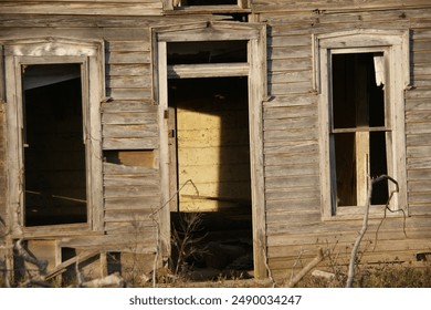 Empty Doorway of Broken Down Abandoned House - Powered by Shutterstock