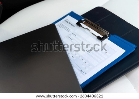 Empty driving test report in the car. Close up. Ready for the exams. Driving test, driver courses, exam concept