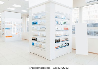 Empty drugstore chemist`s shop pharmacy without staff clients customers visitors with remedies, pills, medicines, goods, painkillers, jars on shelves