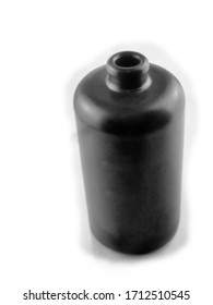 Empty Earthenware Bottle Without A Cap On A Light Background, This Black And White Photo Was Taken With A Pinhole Camera, Which Corresponds To The Camera Characteristic