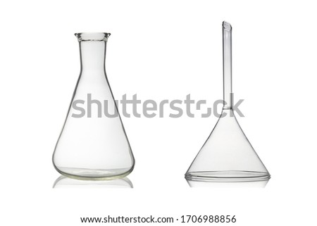 Empty Erlenmeyer flask and glass funnel isolated background.
