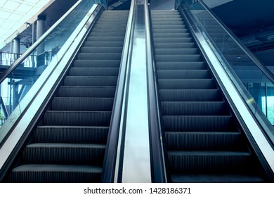 Empty Escalator in Office Building
