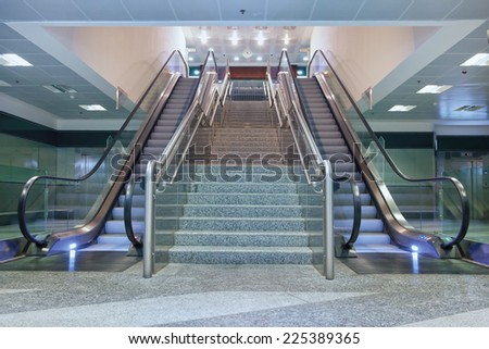 Empty escalator stairs in the airport