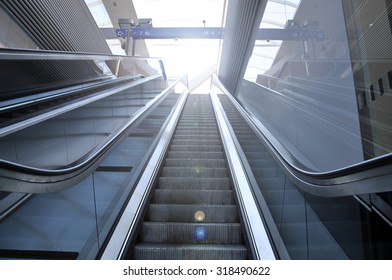 Empty escalator stairs - light effect