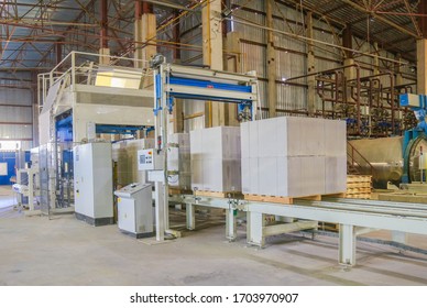 Empty Factory, No People. Factory For The Production Of Foam Concrete Blocks, The Plant Operates In An Autonomous Mode, Environmental Production. Concept Of Ecological Production.