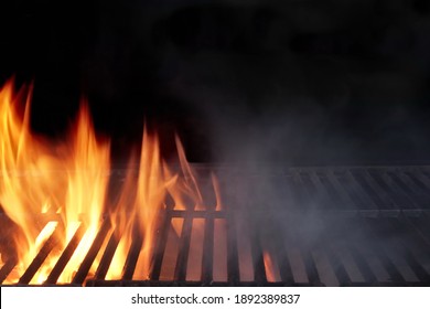 Empty Flaming BBQ Charcoal Grill, Closeup. Hot Barbeque Grill Ready Cooking Food On Cast Iron Grate. Concept For Cookout, Barbecue Party At Garden Or Backyard. Grill With Bright Flames Black Isolated. - Shutterstock ID 1892389837